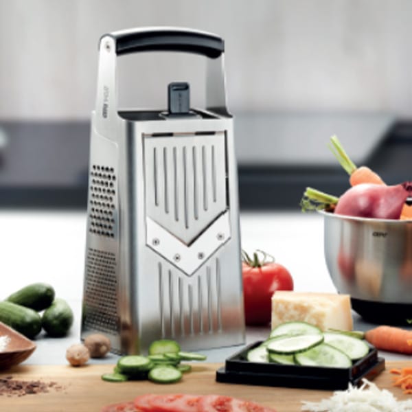 The Best Electric Cheese Grater - Hammacher Schlemmer